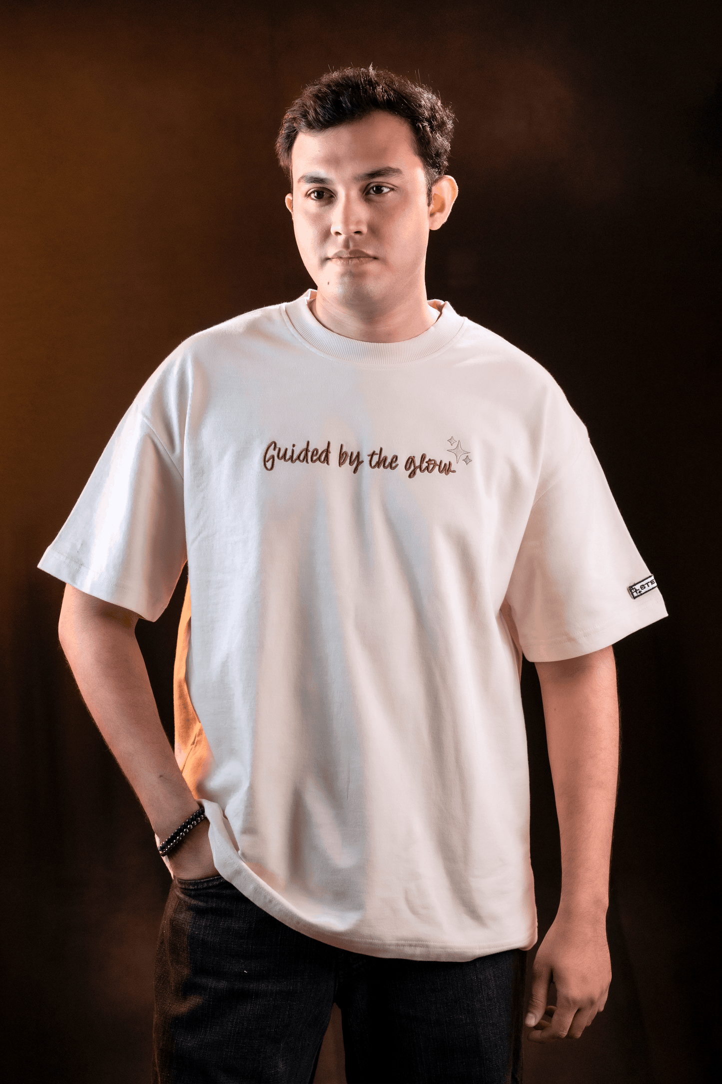 GUIDED BY THE GLOW - UNISEX OVERSIZED EMBROIDERED TEE